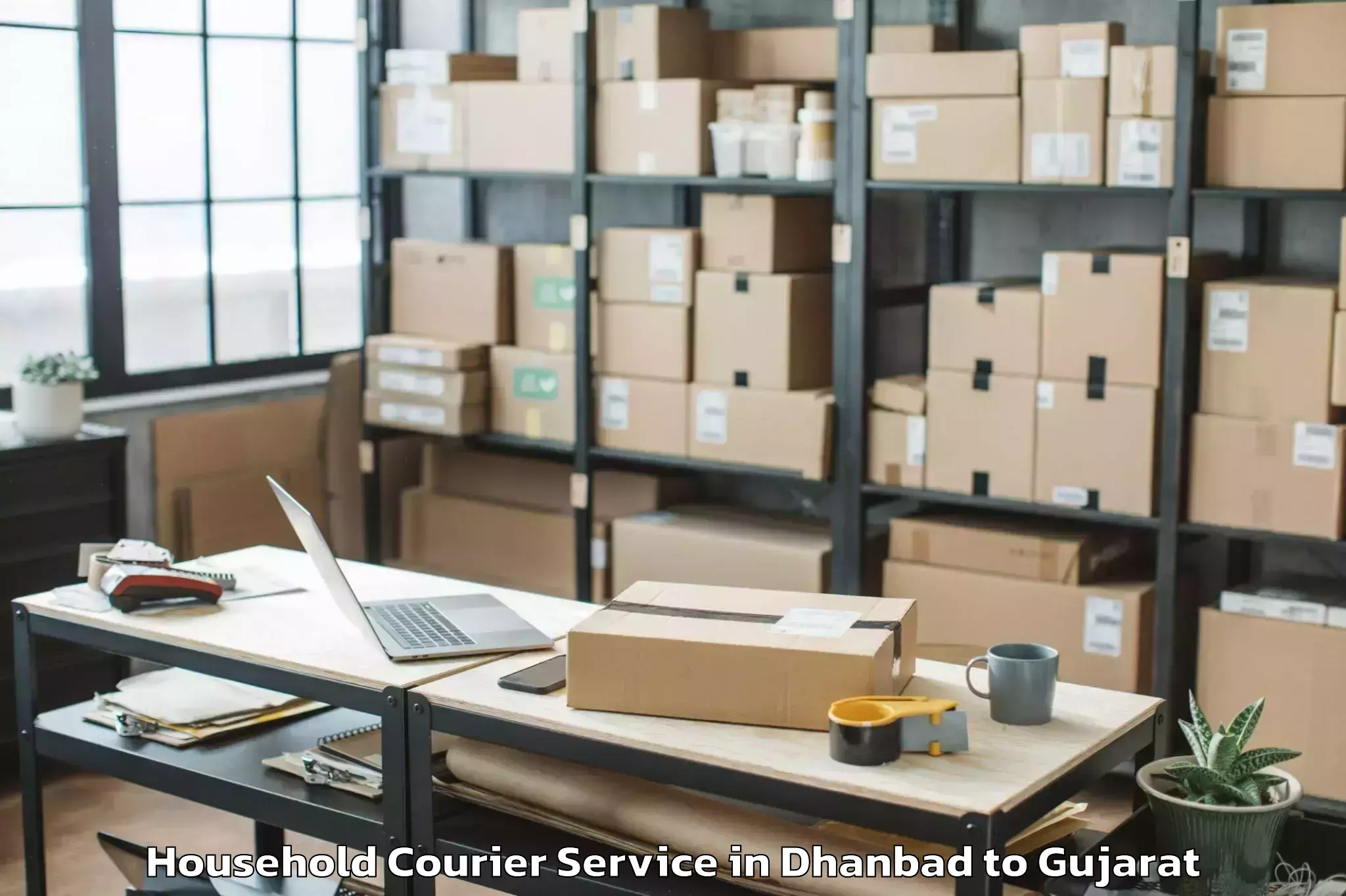 Reliable Dhanbad to Pandit Deendayal Petroleum Uni Household Courier